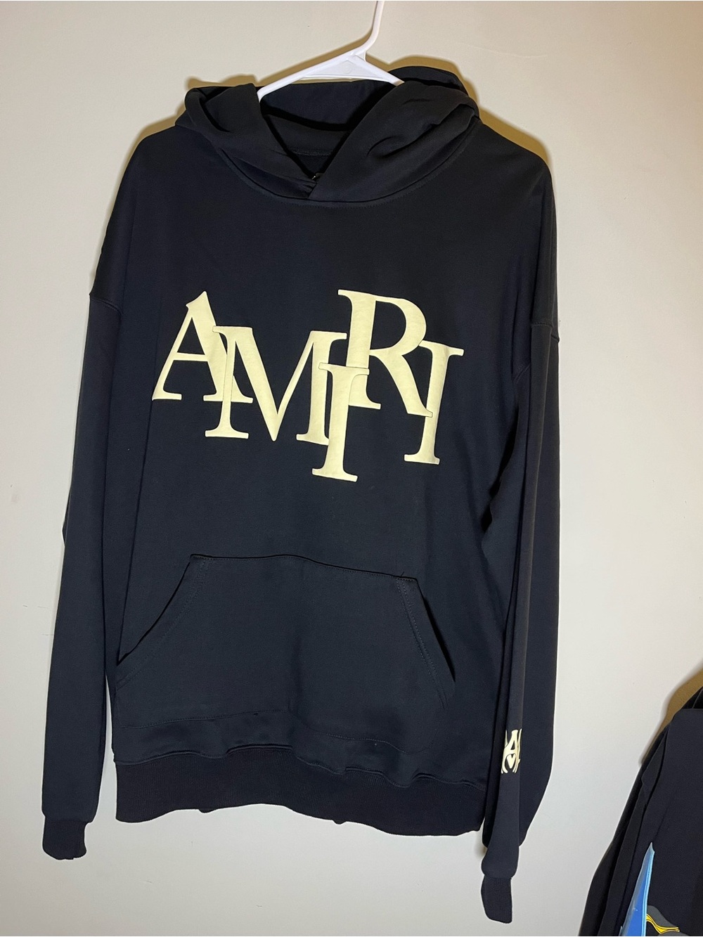 AMIRI Black Hoodie with Cream Lettering